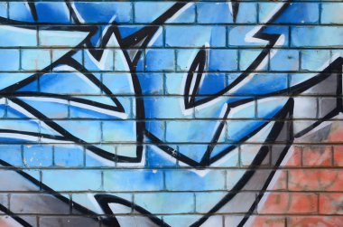 Grafiti çizimler parçası. Eski duvar boya lekeleri sokak sanatı kültür tarzı ile dekore edilmiştir. Renkli arka plan doku.