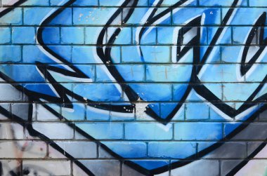 Grafiti çizimler parçası. Eski duvar boya lekeleri sokak sanatı kültür tarzı ile dekore edilmiştir. Renkli arka plan doku.