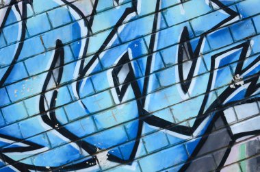 Grafiti çizimler parçası. Eski duvar boya lekeleri sokak sanatı kültür tarzı ile dekore edilmiştir. Renkli arka plan doku.
