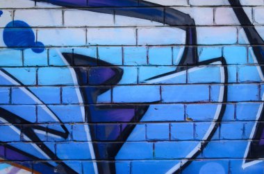 Grafiti çizimler parçası. Eski duvar boya lekeleri sokak sanatı kültür tarzı ile dekore edilmiştir. Renkli arka plan doku.