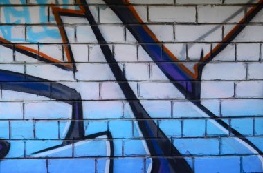 Grafiti çizimler parçası. Eski duvar boya lekeleri sokak sanatı kültür tarzı ile dekore edilmiştir. Renkli arka plan doku.
