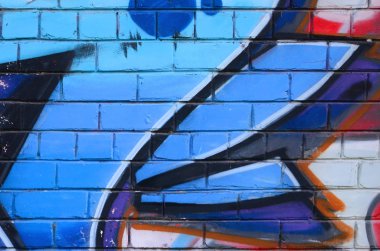 Grafiti çizimler parçası. Eski duvar boya lekeleri sokak sanatı kültür tarzı ile dekore edilmiştir. Renkli arka plan doku.
