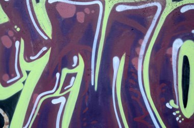 Grafiti çizimler parçası. Eski duvar boya lekeleri sokak sanatı kültür tarzı ile dekore edilmiştir. Renkli arka plan doku.