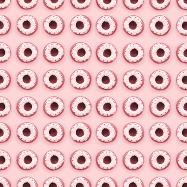 Birçok küçük plastik donuts bir pastel renkli arka plan üzerinde yatıyor. Düz yatıyordu en az desen. Üstten görünüm