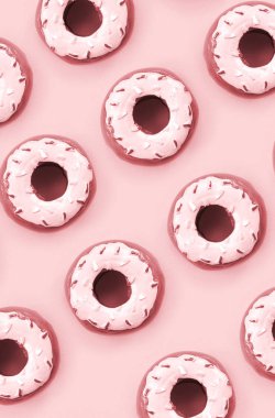 Birçok küçük plastik donuts bir pastel renkli arka plan üzerinde yatıyor. Düz yatıyordu en az desen. Üstten görünüm