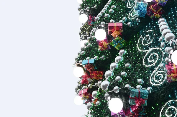 Fragment Huge Christmas Tree Many Ornaments Gift Boxes Luminous Lamps — Stock Photo, Image