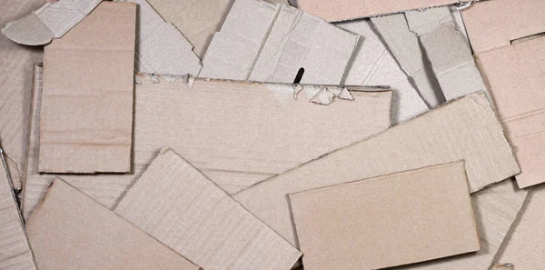 Background of paper textures piled ready to recycle. A pack of old office cardboard for recycling of waste paper. Pile of wastepaper