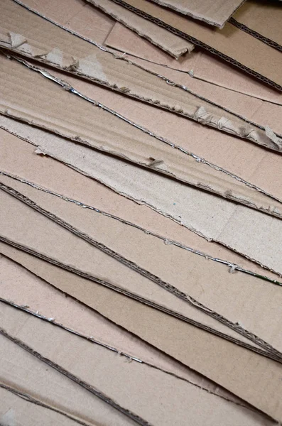 Background of paper textures piled ready to recycle. A pack of old office cardboard for recycling of waste paper. Pile of wastepaper