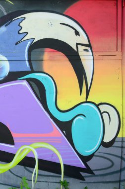 Grafiti çizimler parçası. Eski duvar boya lekeleri sokak sanatı kültür tarzı ile dekore edilmiştir. Renkli arka plan doku soğuk tonlarda.