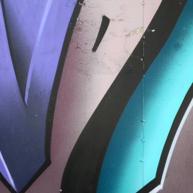 Grafiti çizimler parçası. Eski duvar boya lekeleri sokak sanatı kültür tarzı ile dekore edilmiştir. Renkli arka plan doku soğuk tonlarda.
