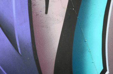 Grafiti çizimler parçası. Eski duvar boya lekeleri sokak sanatı kültür tarzı ile dekore edilmiştir. Renkli arka plan doku soğuk tonlarda.