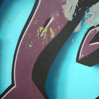 Grafiti çizimler parçası. Eski duvar boya lekeleri sokak sanatı kültür tarzı ile dekore edilmiştir. Renkli arka plan doku soğuk tonlarda.