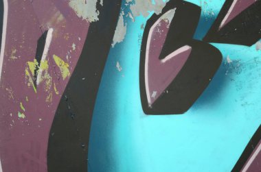 Grafiti çizimler parçası. Eski duvar boya lekeleri sokak sanatı kültür tarzı ile dekore edilmiştir. Renkli arka plan doku soğuk tonlarda.