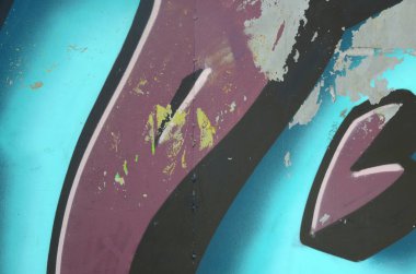 Grafiti çizimler parçası. Eski duvar boya lekeleri sokak sanatı kültür tarzı ile dekore edilmiştir. Renkli arka plan doku soğuk tonlarda.