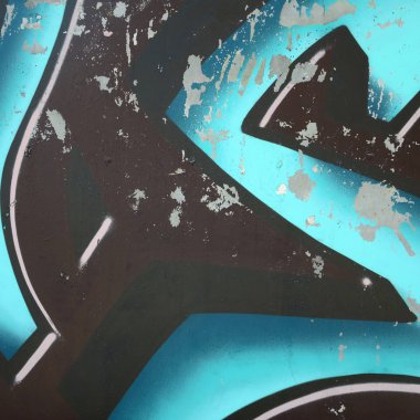 Grafiti çizimler parçası. Eski duvar boya lekeleri sokak sanatı kültür tarzı ile dekore edilmiştir. Renkli arka plan doku soğuk tonlarda.