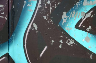 Grafiti çizimler parçası. Eski duvar boya lekeleri sokak sanatı kültür tarzı ile dekore edilmiştir. Renkli arka plan doku soğuk tonlarda.