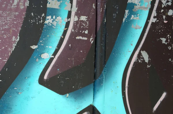 Grafiti çizimler parçası. Eski duvar boya lekeleri sokak sanatı kültür tarzı ile dekore edilmiştir. Renkli arka plan doku soğuk tonlarda.