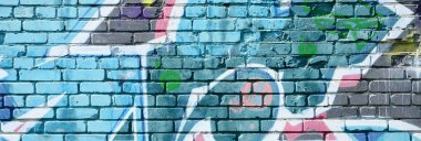 Grafiti çizimler parçası. Eski duvar boya lekeleri sokak sanatı kültür tarzı ile dekore edilmiştir. Renkli arka plan doku soğuk tonlarda.