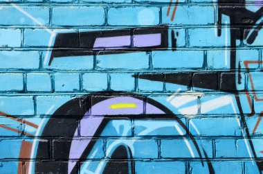 Grafiti çizimler parçası. Eski duvar boya lekeleri sokak sanatı kültür tarzı ile dekore edilmiştir. Renkli arka plan doku soğuk tonlarda.