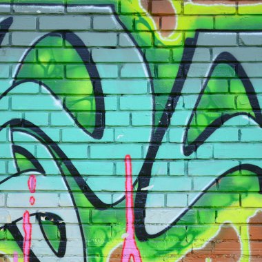 Grafiti çizimler parçası. Eski duvar boya lekeleri sokak sanatı kültür tarzı ile dekore edilmiştir. Yeşil tonlarında renkli arka plan doku.