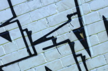 Grafiti çizimler parçası. Eski duvar boya lekeleri sokak sanatı kültür tarzı ile dekore edilmiştir. Renkli arka plan doku.
