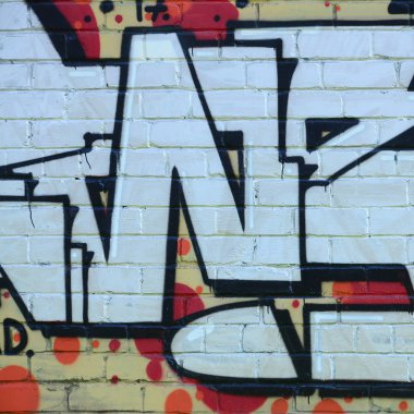 Grafiti çizimler parçası. Eski duvar boya lekeleri sokak sanatı kültür tarzı ile dekore edilmiştir. Renkli arka plan doku.