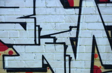 Grafiti çizimler parçası. Eski duvar boya lekeleri sokak sanatı kültür tarzı ile dekore edilmiştir. Renkli arka plan doku.