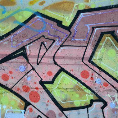 Grafiti çizimler parçası. Eski duvar boya lekeleri sokak sanatı kültür tarzı ile dekore edilmiştir. Renkli arka plan doku sıcak tonları içinde.
