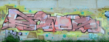Grafiti çizimler parçası. Eski duvar boya lekeleri sokak sanatı kültür tarzı ile dekore edilmiştir. Renkli arka plan doku sıcak tonları içinde.