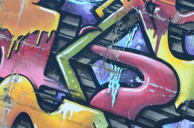 Grafiti çizimler parçası. Eski duvar boya lekeleri sokak sanatı kültür tarzı ile dekore edilmiştir. Renkli arka plan doku sıcak tonları içinde.