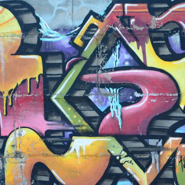 Grafiti çizimler parçası. Eski duvar boya lekeleri sokak sanatı kültür tarzı ile dekore edilmiştir. Renkli arka plan doku sıcak tonları içinde.