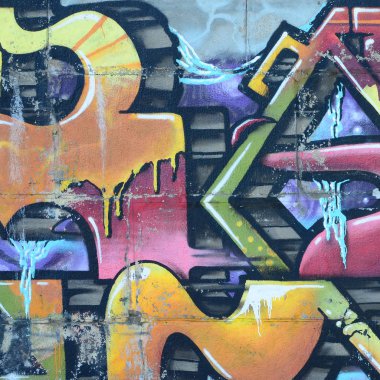 Grafiti çizimler parçası. Eski duvar boya lekeleri sokak sanatı kültür tarzı ile dekore edilmiştir. Renkli arka plan doku sıcak tonları içinde.