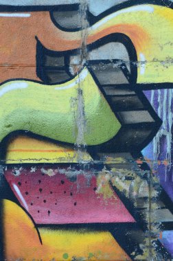 Grafiti çizimler parçası. Eski duvar boya lekeleri sokak sanatı kültür tarzı ile dekore edilmiştir. Renkli arka plan doku sıcak tonları içinde.