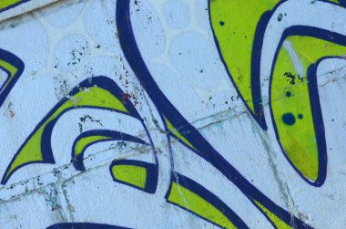 Grafiti çizimler parçası. Eski duvar boya lekeleri sokak sanatı kültür tarzı ile dekore edilmiştir. Yeşil tonlarında renkli arka plan doku.