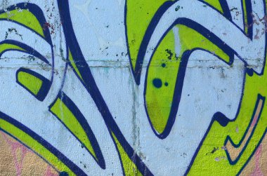 Grafiti çizimler parçası. Eski duvar boya lekeleri sokak sanatı kültür tarzı ile dekore edilmiştir. Yeşil tonlarında renkli arka plan doku.