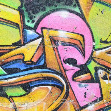 Grafiti çizimler parçası. Eski duvar boya lekeleri sokak sanatı kültür tarzı ile dekore edilmiştir. Çok renkli arka plan dokusu.