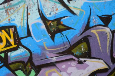 Grafiti çizimler parçası. Eski duvar boya lekeleri sokak sanatı kültür tarzı ile dekore edilmiştir. Renkli arka plan doku soğuk tonlarda.
