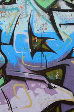 Grafiti çizimler parçası. Eski duvar boya lekeleri sokak sanatı kültür tarzı ile dekore edilmiştir. Renkli arka plan doku soğuk tonlarda.