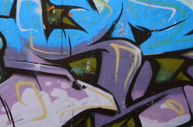 Grafiti çizimler parçası. Eski duvar boya lekeleri sokak sanatı kültür tarzı ile dekore edilmiştir. Renkli arka plan doku soğuk tonlarda.