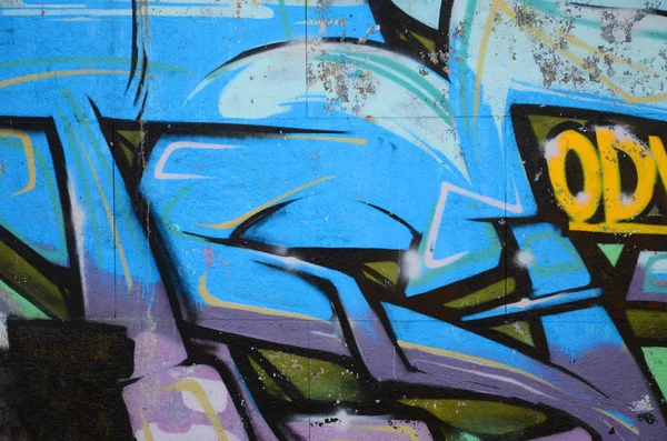 Grafiti çizimler parçası. Eski duvar boya lekeleri sokak sanatı kültür tarzı ile dekore edilmiştir. Renkli arka plan doku soğuk tonlarda.