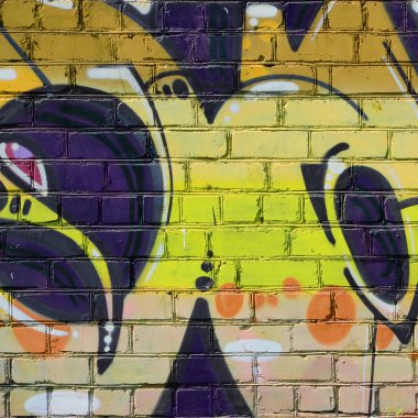 Grafiti çizimler parçası. Eski duvar boya lekeleri sokak sanatı kültür tarzı ile dekore edilmiştir. Renkli arka plan doku sıcak tonları içinde.