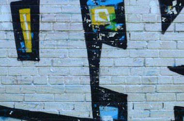 Grafiti çizimler parçası. Eski duvar boya lekeleri sokak sanatı kültür tarzı ile dekore edilmiştir. Renkli arka plan doku.