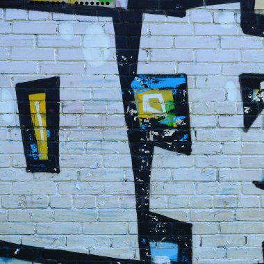 Grafiti çizimler parçası. Eski duvar boya lekeleri sokak sanatı kültür tarzı ile dekore edilmiştir. Renkli arka plan doku.