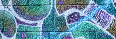 Grafiti çizimler parçası. Eski duvar boya lekeleri sokak sanatı kültür tarzı ile dekore edilmiştir. Renkli arka plan doku soğuk tonlarda.