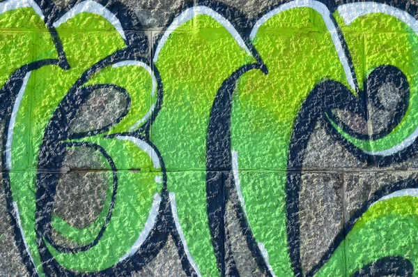 落書き図面のフラグメント 古い壁塗料の汚れストリート アート文化のスタイルで飾られています 緑のトーンの色の背景のテクスチャ — ストック写真