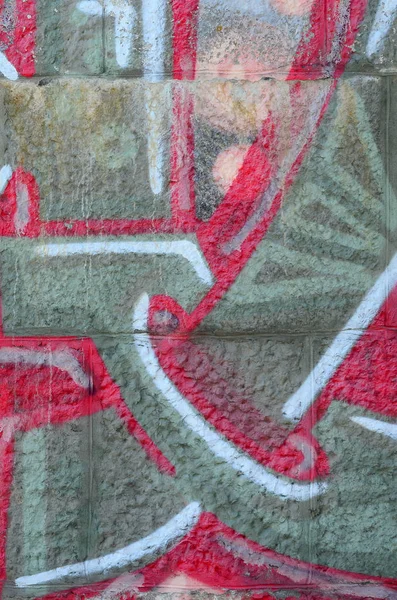 落書き図面のフラグメント 古い壁塗料の汚れストリート アート文化のスタイルで飾られています 温かみのある色調で色付きの背景テクスチャ — ストック写真