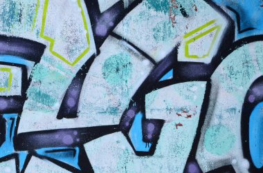 Grafiti çizimler parçası. Eski duvar boya lekeleri sokak sanatı kültür tarzı ile dekore edilmiştir. Renkli arka plan doku soğuk tonlarda.