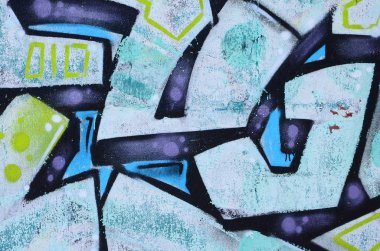 Grafiti çizimler parçası. Eski duvar boya lekeleri sokak sanatı kültür tarzı ile dekore edilmiştir. Renkli arka plan doku soğuk tonlarda.