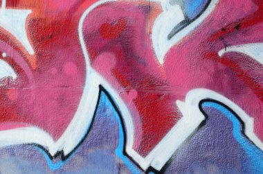Grafiti çizimler parçası. Eski duvar boya lekeleri sokak sanatı kültür tarzı ile dekore edilmiştir. Renkli arka plan doku sıcak tonları içinde.