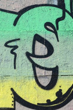 Grafiti çizimler parçası. Eski duvar boya lekeleri sokak sanatı kültür tarzı ile dekore edilmiştir. Yeşil tonlarında renkli arka plan doku.